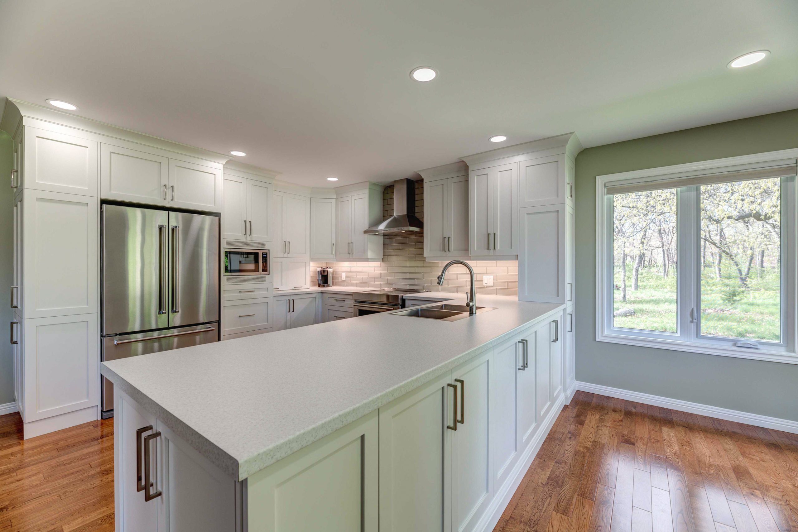 recessed can light over a kitchen island